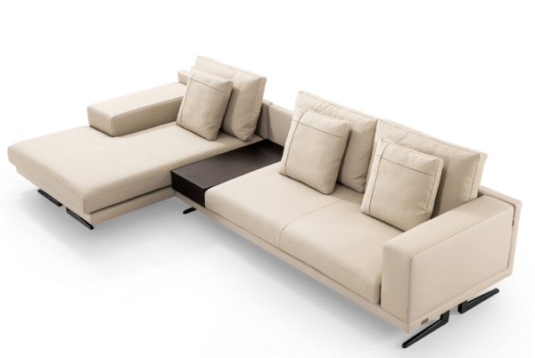 Italian minimalist sofa in the large penthouse living room of the villa, featuring all dark leather sofas.